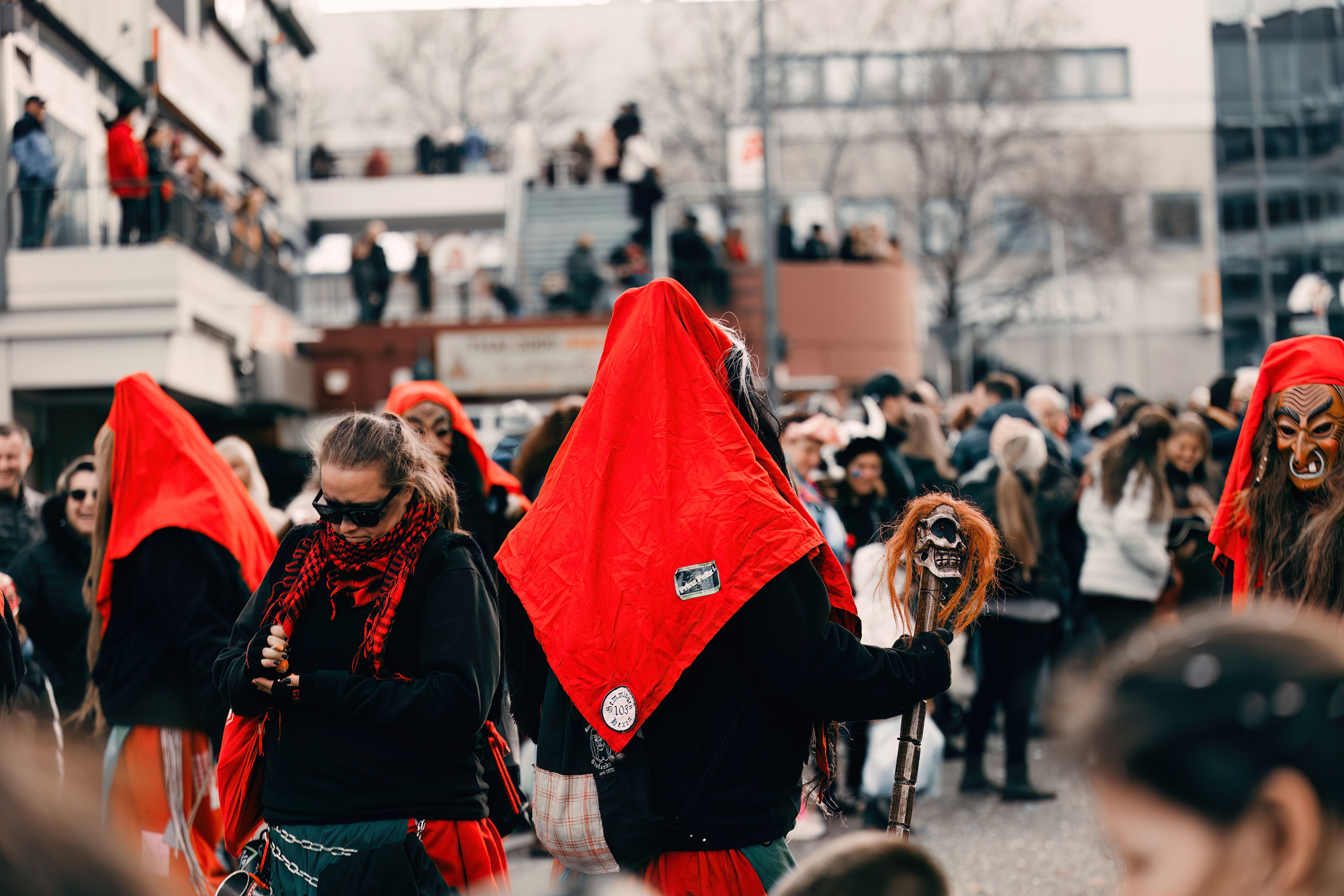 Festive parade in Leonberg, Germany with traditional costumes and colorful masks